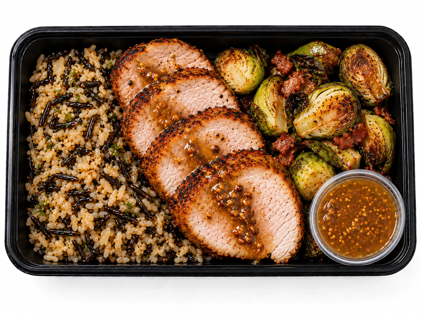 Cider-Brined Pork Loin with Bacon Brussels & Herbed Wild Rice