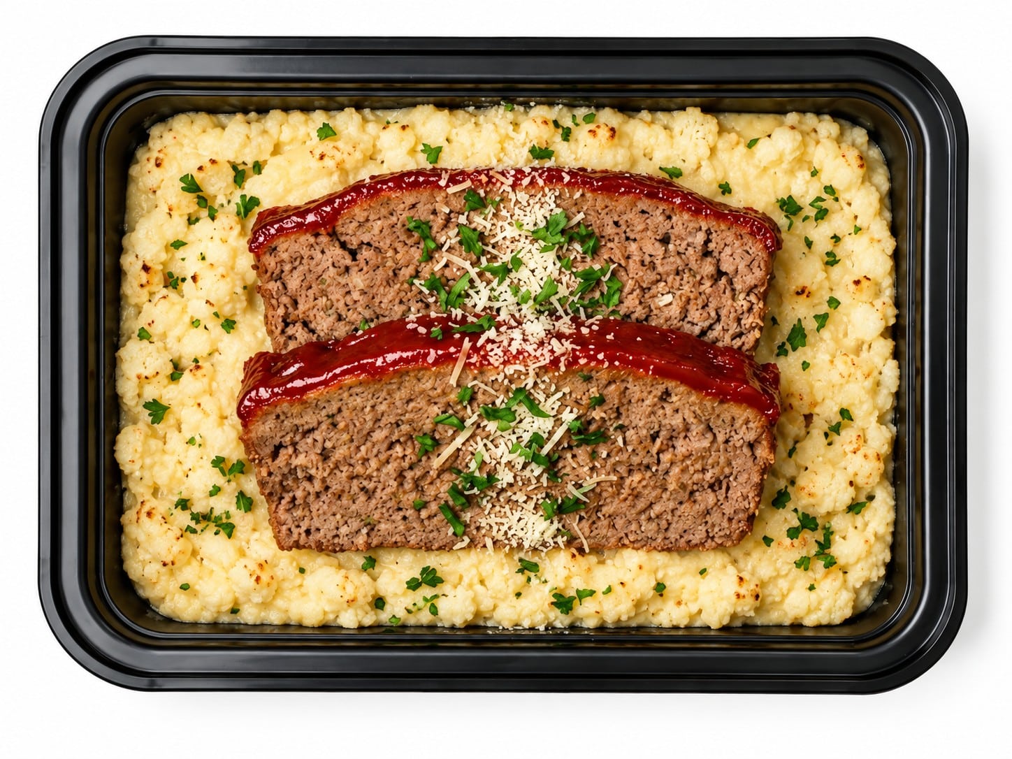 KETO Flashback Meatloaf with Cauliflower & Goat Cheese Puree in a black meal prep container